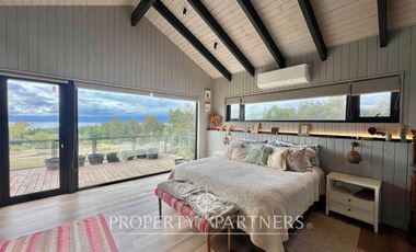 Hermosa casa con vista al lago en parcela a pasos del colegio Alemán