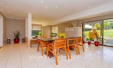 Hermosa Parcela en exclusivo Condominio las Tórtolas, Santa Rita, el mejor sector de Pirque ( Con derecho de canal)