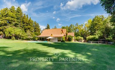 Hermosa Parcela en exclusivo Condominio las Tórtolas, Santa Rita, el mejor sector de Pirque ( Con derecho de canal)