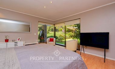 Hermosa Parcela en exclusivo Condominio las Tórtolas, Santa Rita, el mejor sector de Pirque ( Con derecho de canal)