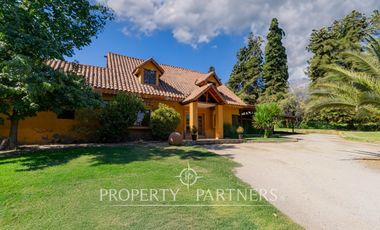 Hermosa Parcela en exclusivo Condominio las Tórtolas, Santa Rita, el mejor sector de Pirque ( Con derecho de canal)