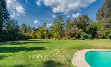 Hermosa Parcela en exclusivo Condominio las Tórtolas, Santa Rita, el mejor sector de Pirque ( Con derecho de canal)