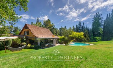 Hermosa Parcela en exclusivo Condominio las Tórtolas, Santa Rita, el mejor sector de Pirque ( Con derecho de canal)