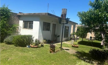 CASA Y DEPTO CALLE  TORQUINS