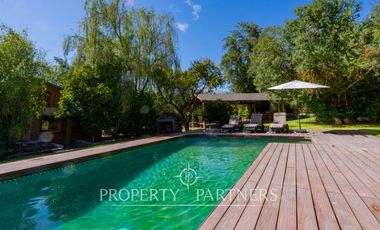 Parcela Llena de Luz y Espacios Abiertos en exclusivo y seguro condominio La Rinconada del Principal, Pirque (con piscina, quincho y un gran jardín)