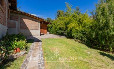 Parcela Llena de Luz y Espacios Abiertos en exclusivo y seguro condominio La Rinconada del Principal, Pirque (con piscina, quincho y un gran jardín)