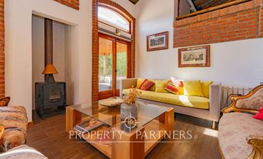 Parcela Llena de Luz y Espacios Abiertos en exclusivo y seguro condominio La Rinconada del Principal, Pirque (con piscina, quincho y un gran jardín)