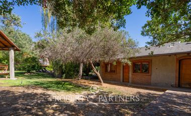 Parcela Llena de Luz y Espacios Abiertos en exclusivo y seguro condominio La Rinconada del Principal, Pirque (con piscina, quincho y un gran jardín)