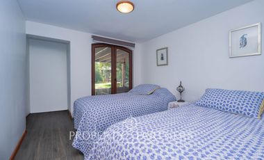 Parcela Llena de Luz y Espacios Abiertos en exclusivo y seguro condominio La Rinconada del Principal, Pirque (con piscina, quincho y un gran jardín)