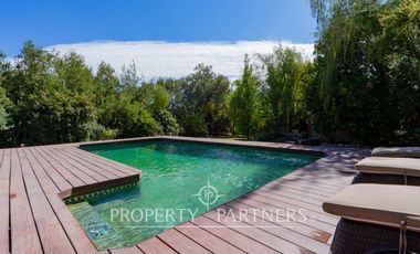 Parcela Llena de Luz y Espacios Abiertos en exclusivo y seguro condominio La Rinconada del Principal, Pirque (con piscina, quincho y un gran jardín)