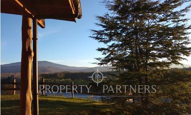 Hermosa Parcela con dos casas vista al Río