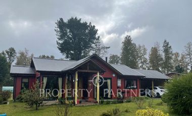 Parcela con casa en sector Cayumapu, distante a 17 km de Valdivia.