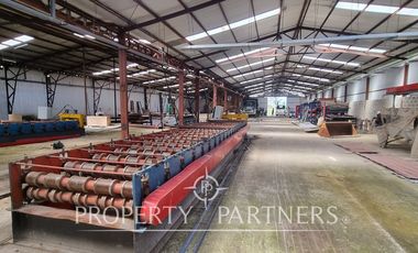 Terreno con 2 Galpones Grandes en Salida Sur de Valdivia