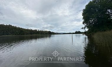 Terreno en condominio, con hermosa vista al Rio Angachilla
