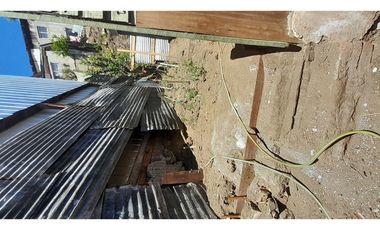 Terreno con Casa En Puerto Aysen N° 166, Cer