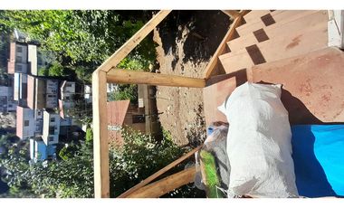 Terreno con Casa En Puerto Aysen N° 166, Cer