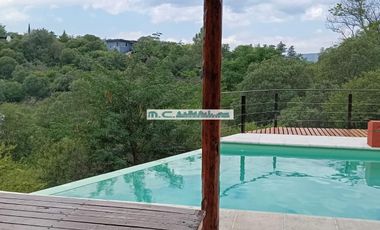 AT108. CUESTA BLANCA. HERMOSA CASA CON PILETA Y GRAN VISTA (3/4 PAX)