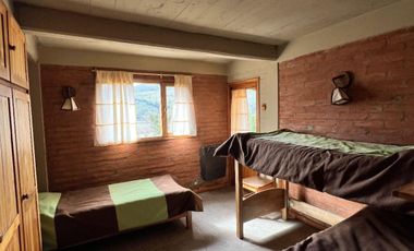 Chalet en alquiler temporario de 3 dormitorios , quincho y    cochera en San Martin de los Andes