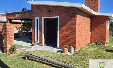Casa en alquiler temporario de 2 dormitorios c/ cochera en Villa Cura Brochero