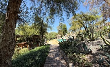 TERRENO DE 16450M2 CON CASA, PISCINA, OFICINA Y GALPÓN