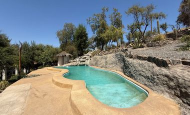 TERRENO DE 16450M2 CON CASA, PISCINA, OFICINA Y GALPÓN