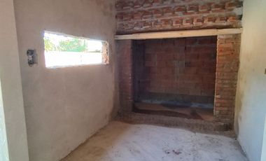 VENDO LOTE CON QUINCHO EN CONSTRUCCION (NECOCHEA)