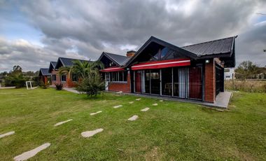 CASA 5 AMBIENTES PERMUTA PILETA QUINCHO PARRILLA