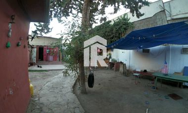 Venta Terreno con 2 locales comerciales.