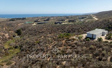 “Vive Frente al Mar en Agua Dulce: Terreno Exclusivo con Vista Inalterable en Huentelauquén”