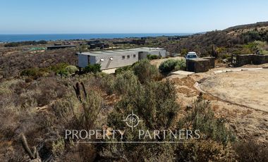 “Vive Frente al Mar en Agua Dulce: Terreno Exclusivo con Vista Inalterable en Huentelauquén”