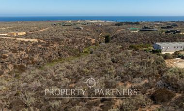 “Vive Frente al Mar en Agua Dulce: Terreno Exclusivo con Vista Inalterable en Huentelauquén”