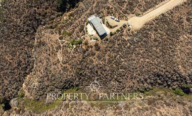 “Vive Frente al Mar en Agua Dulce: Terreno Exclusivo con Vista Inalterable en Huentelauquén”