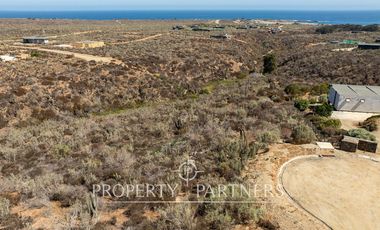 “Vive Frente al Mar en Agua Dulce: Terreno Exclusivo con Vista Inalterable en Huentelauquén”