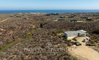 “Vive Frente al Mar en Agua Dulce: Terreno Exclusivo con Vista Inalterable en Huentelauquén”