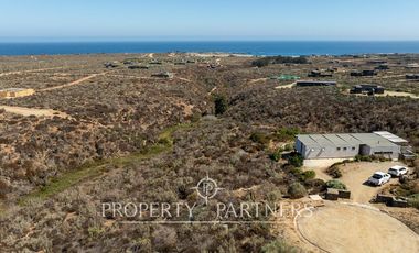 “Vive Frente al Mar en Agua Dulce: Terreno Exclusivo con Vista Inalterable en Huentelauquén”