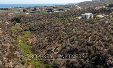 “Vive Frente al Mar en Agua Dulce: Terreno Exclusivo con Vista Inalterable en Huentelauquén”