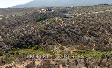 “Vive Frente al Mar en Agua Dulce: Terreno Exclusivo con Vista Inalterable en Huentelauquén”
