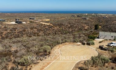 “Vive Frente al Mar en Agua Dulce: Terreno Exclusivo con Vista Inalterable en Huentelauquén”