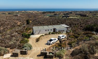 “Vive Frente al Mar en Agua Dulce: Terreno Exclusivo con Vista Inalterable en Huentelauquén”