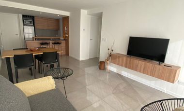 Departamento de dos amb en alquiler con cochera.