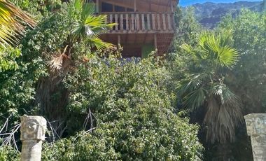 VENTA PARCELA  CON  CASA , ARBOLES FRUTALES Y PARRONALES