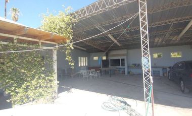 Casa de 4 dormitorios. Dos tinglados. Sarmiento
