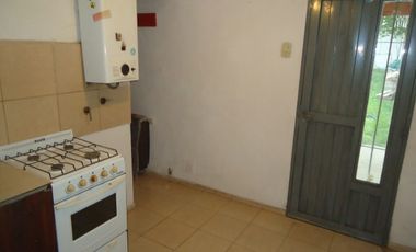 San Roque, Sobre calle principal del barrio.-