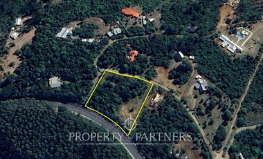 Hermosa Parcela en Sector Chabelita, Orilla de Camino Pavimentado