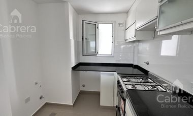 Departamento de dos dormitorios con cochera y baulera en venta