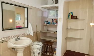 Casa con gran terreno en venta en segunda fila de la playa en Chuburná Puerto
