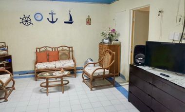 Casa con gran terreno en venta en segunda fila de la playa en Chuburná Puerto
