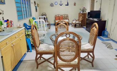 Casa con gran terreno en venta en segunda fila de la playa en Chuburná Puerto