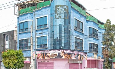 Edificio multi funcional en zona comercial