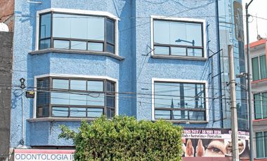 Edificio multi funcional en zona comercial